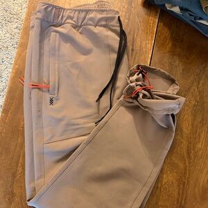 RHONE Tan Joggers with Black and Red Accents
